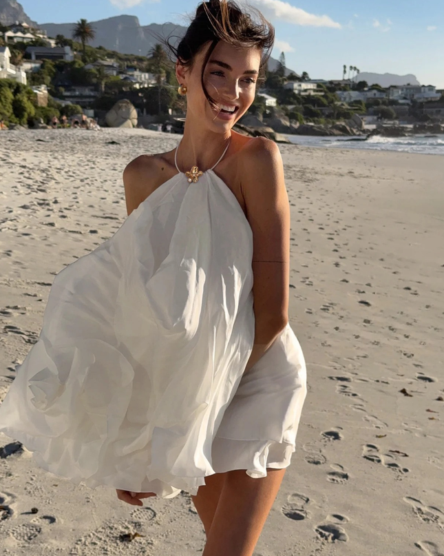 Sola | Flowing Mini Dress – Backless Halter Ruffle Style