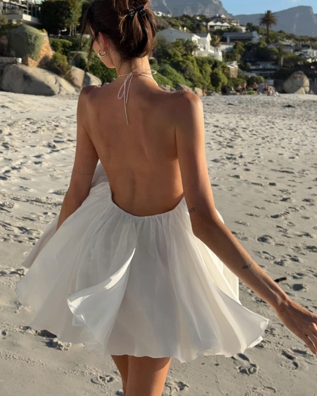 Sola | Flowing Mini Dress – Backless Halter Ruffle Style