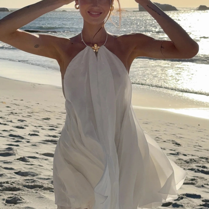 Sola | Flowing Mini Dress – Backless Halter Ruffle Style