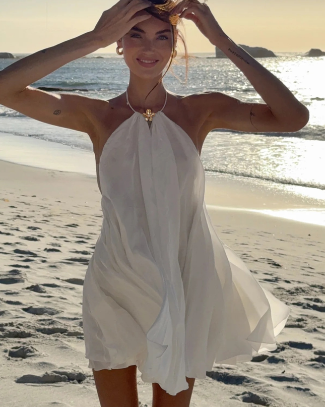 Sola | Flowing Mini Dress – Backless Halter Ruffle Style